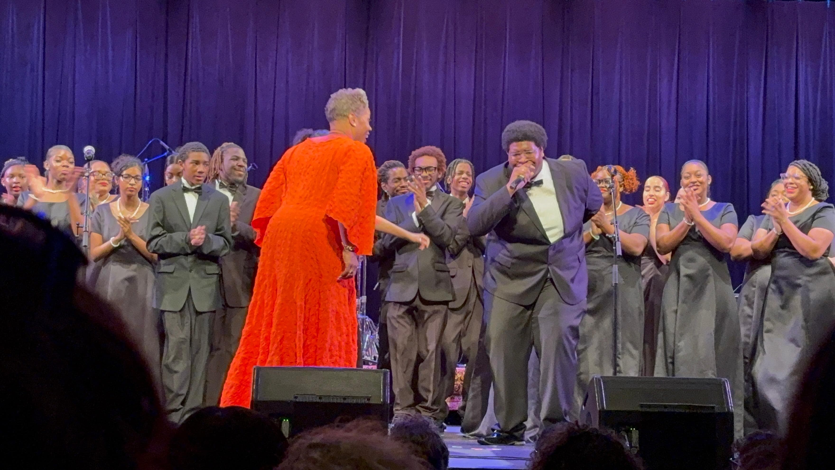 Songs of Solomon singers on stage during a concert finale